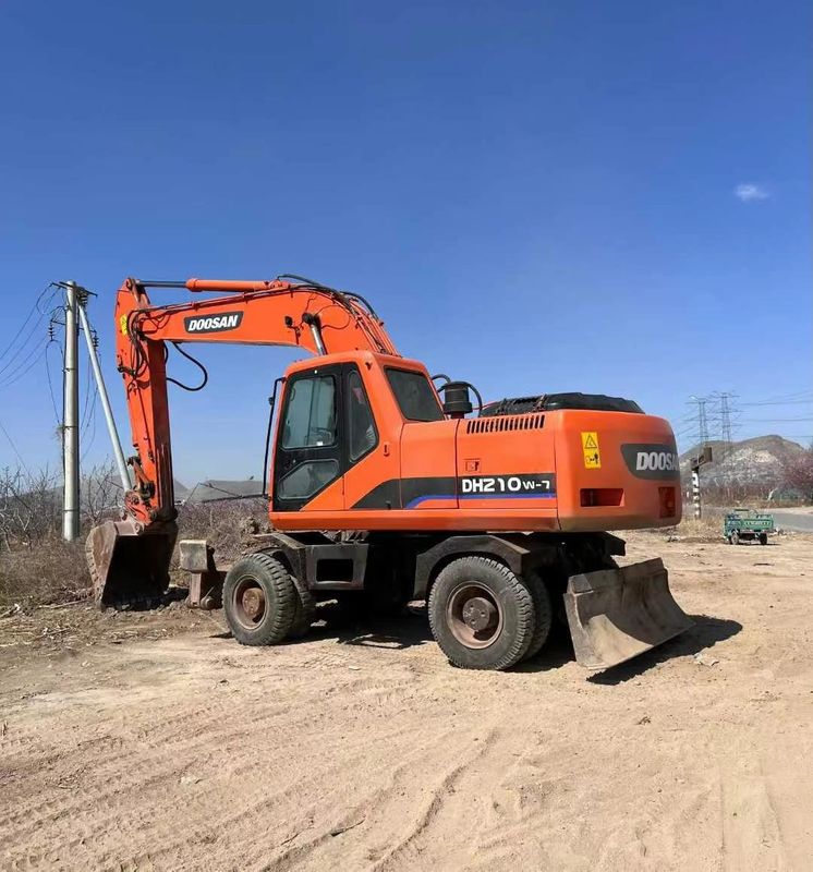 Używany grabarz kołowy Doosan DH210 z napędem hydraulicznym i ciężarem roboczym