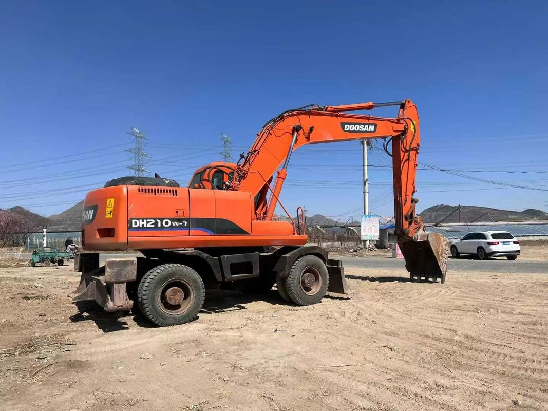 Używany grabarz kołowy Doosan DH210 z napędem hydraulicznym i ciężarem roboczym