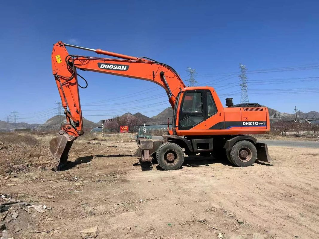 Używany grabarz kołowy Doosan DH210 z napędem hydraulicznym i ciężarem roboczym